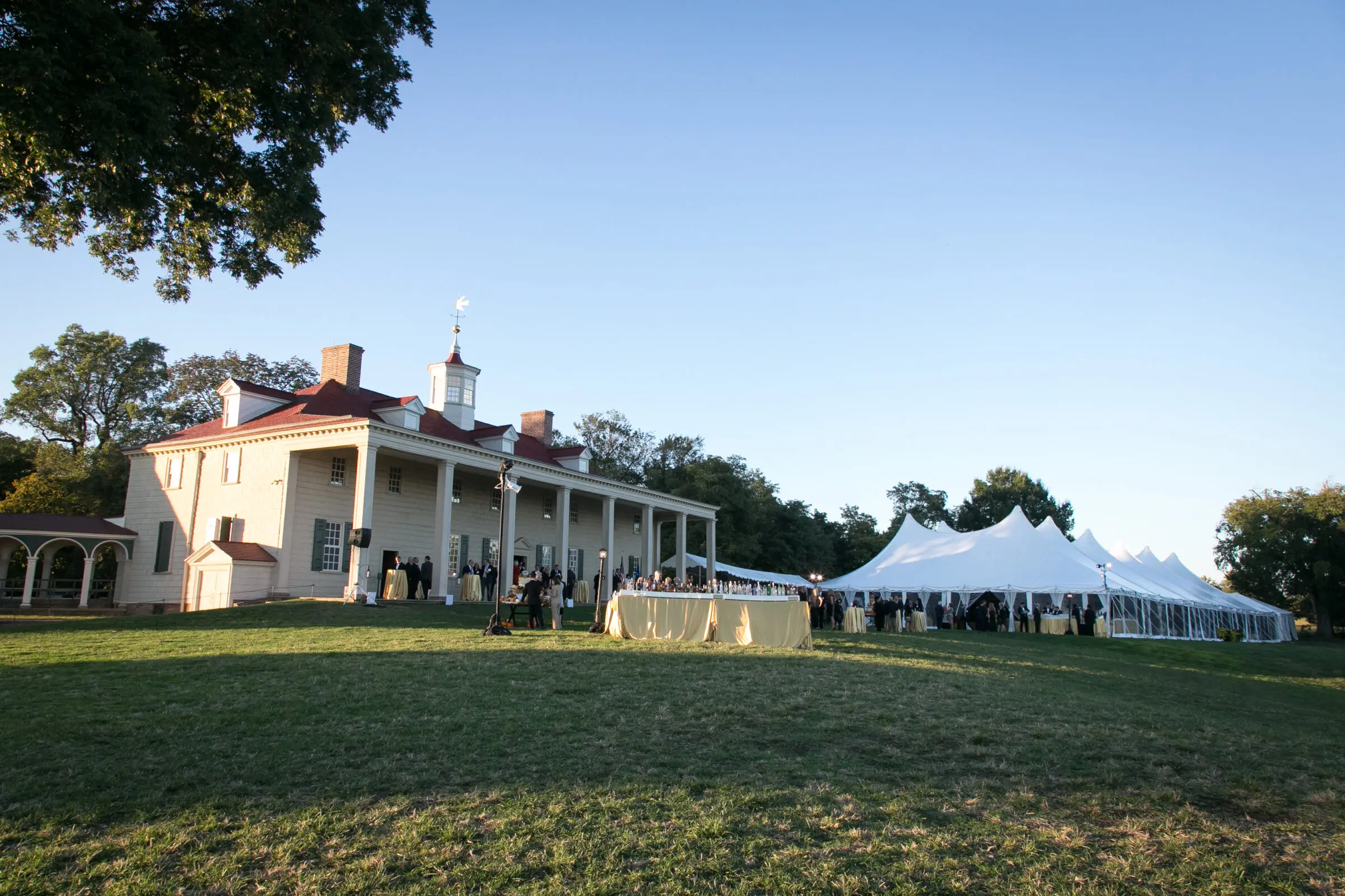 The exterior grounds of George Washington's Mount Vernon, including a tent set up for an event.